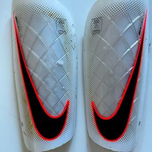 Nike Mercurial LITE shin guards.